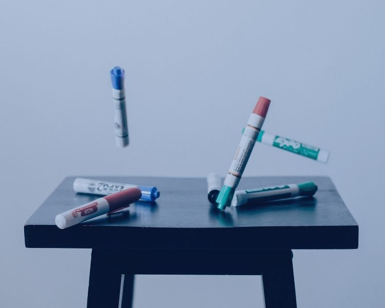 Table with whiteboard pens